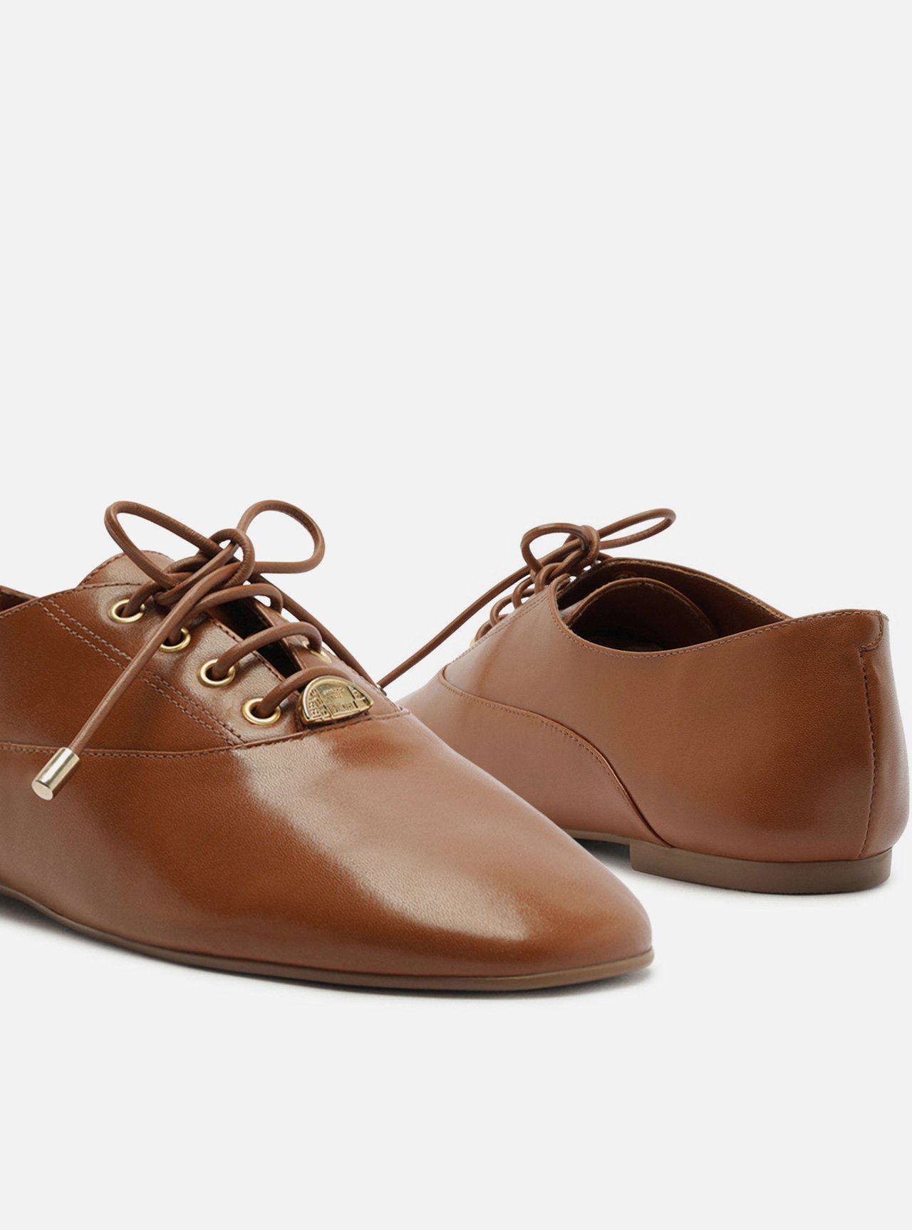 Mocassim Marrom Bico Redondo Metais — foto 4