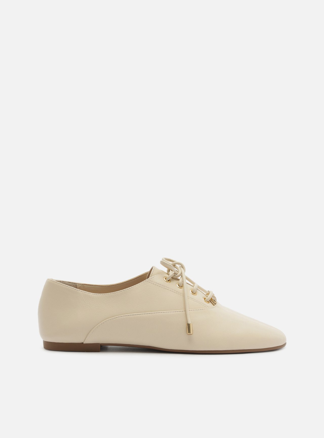 Mocassim Off White Bico Redondo Metais — foto 1